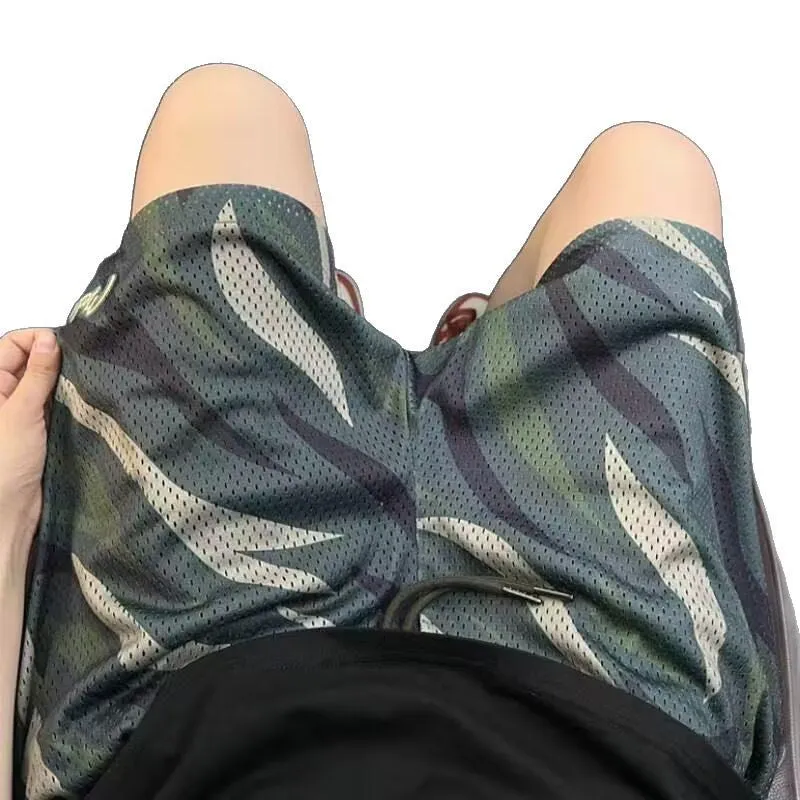 Men's camouflage mesh shorts in straight leg design with cotton blend fabric