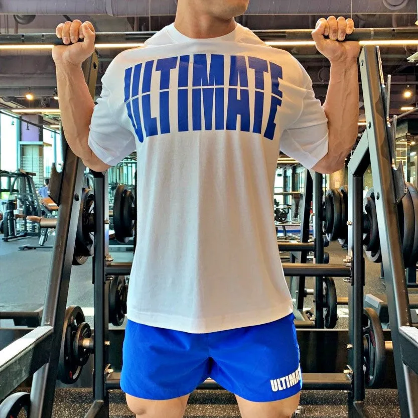 Men's cotton short sleeve round neck gym training top in black and white colourway on model