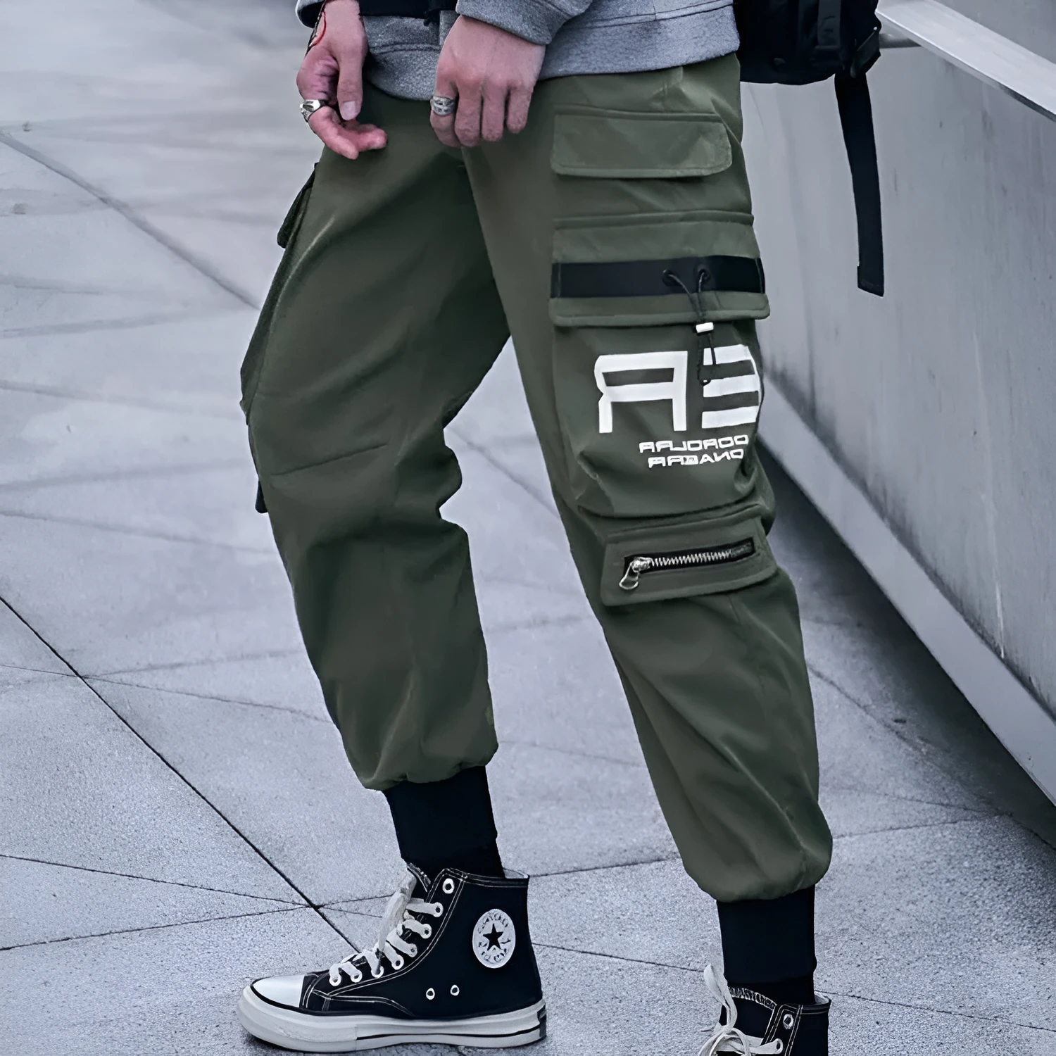 Men's 100% polyester cargo trousers in Army Green with side pockets and drawstring waist