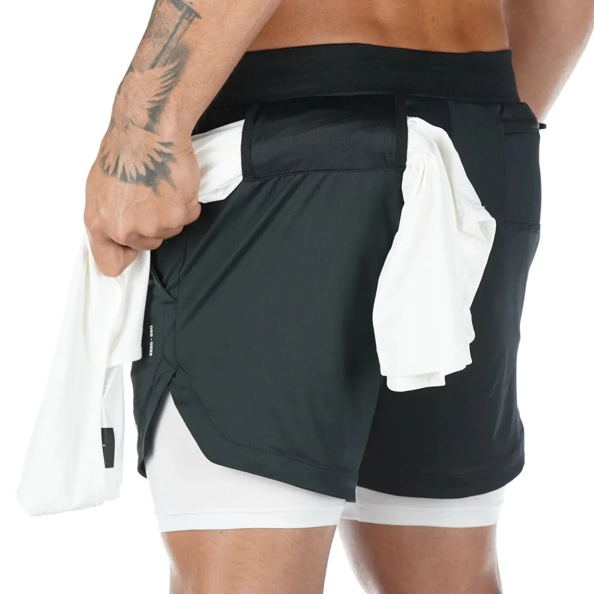 Men's quick-drying double-layer fitness shorts in Army Green with loose fit and moisture-wicking polyester fabric