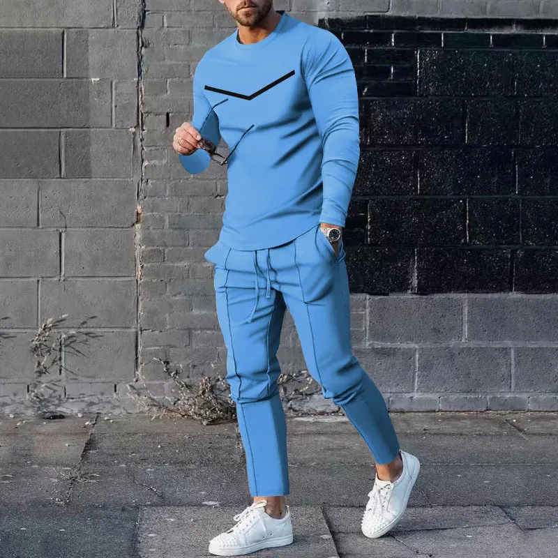 Men's cotton blend round neck long sleeve T-shirt and trousers tracksuit set in light gray on a plain background
