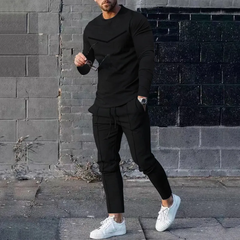 Men's cotton blend round neck long sleeve T-shirt and trousers tracksuit set in light gray on a plain background