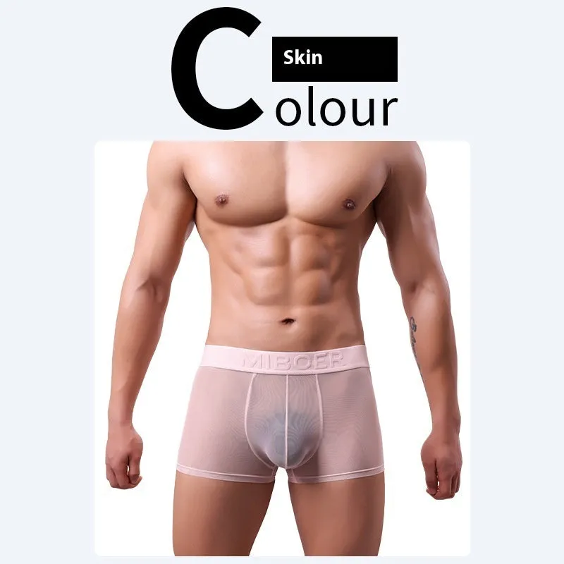 Men's thin polyester boxer shorts in solid colours including black, white, blue, and pink