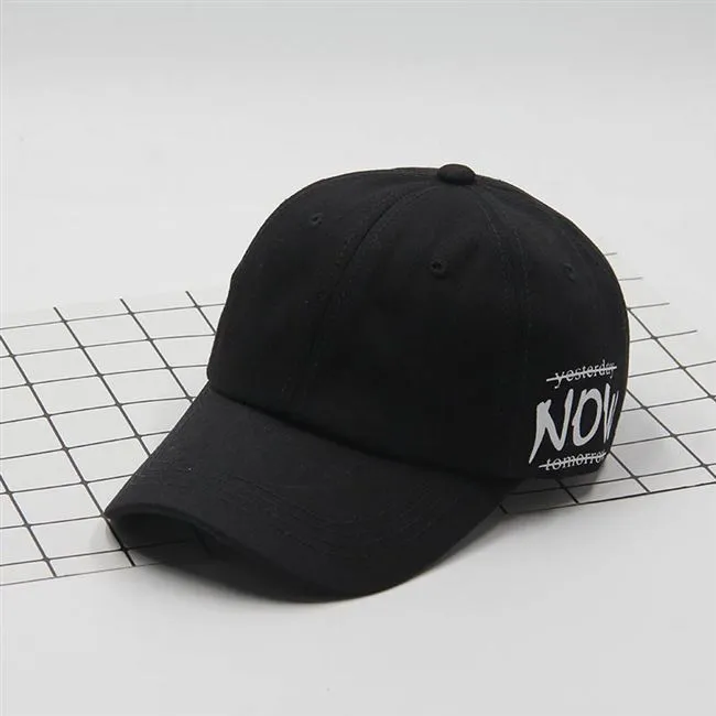 Cotton baseball cap with letter embroidery, adjustable back, curved brim, in beige on white background