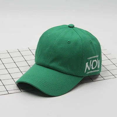 Cotton baseball cap with letter embroidery, adjustable back, curved brim, in beige on white background