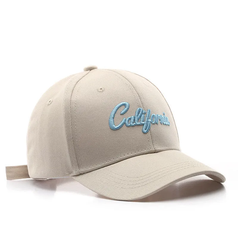 Cotton baseball cap with letter embroidery, adjustable back, curved brim, in beige on white background
