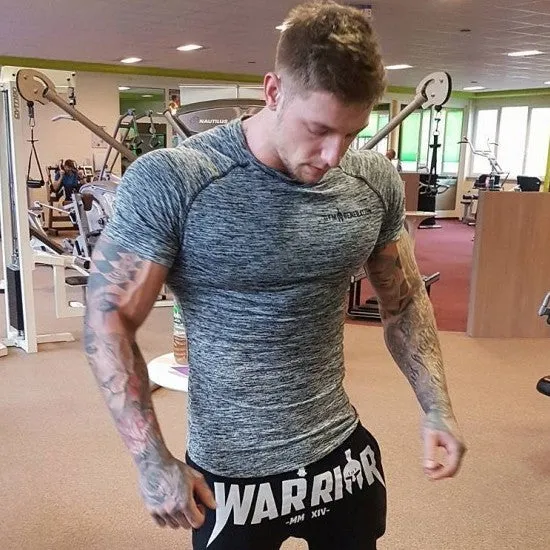 Men's short sleeve polyester workout top in orange colour for gym training