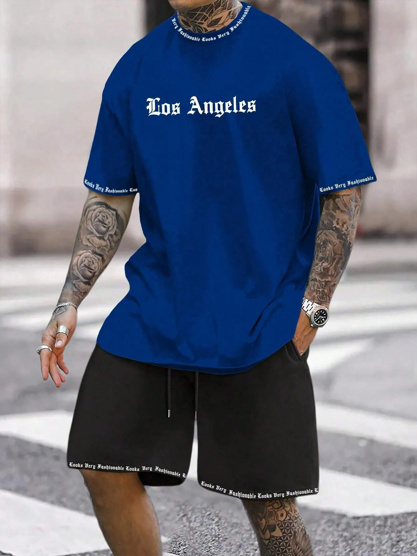 Men's blue sports style short-sleeved top and matching shorts two-piece casual suit set