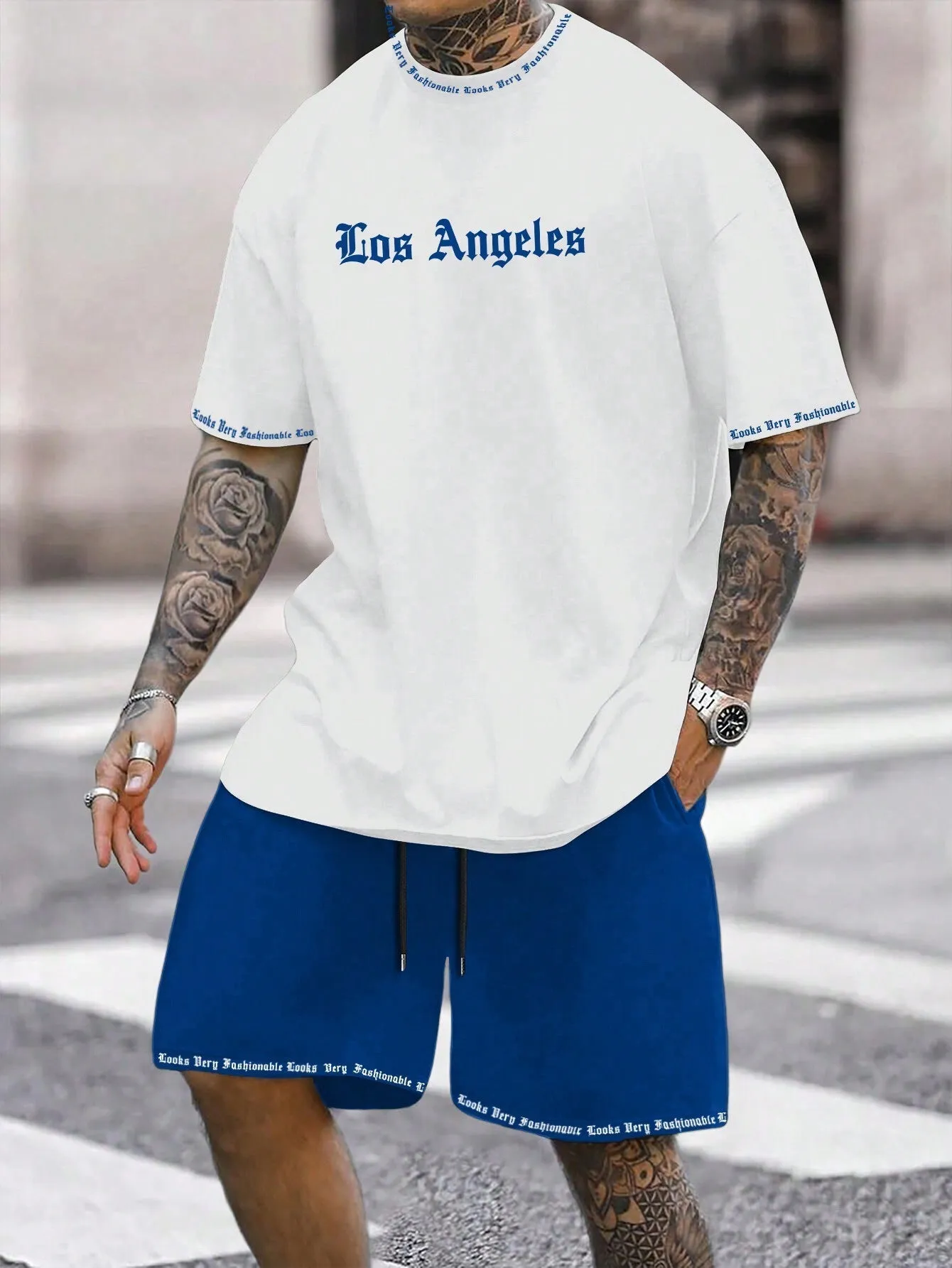 Men's blue sports style short-sleeved top and matching shorts two-piece casual suit set