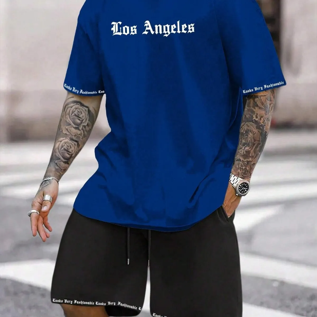 Men's blue sports style short-sleeved top and matching shorts two-piece casual suit set