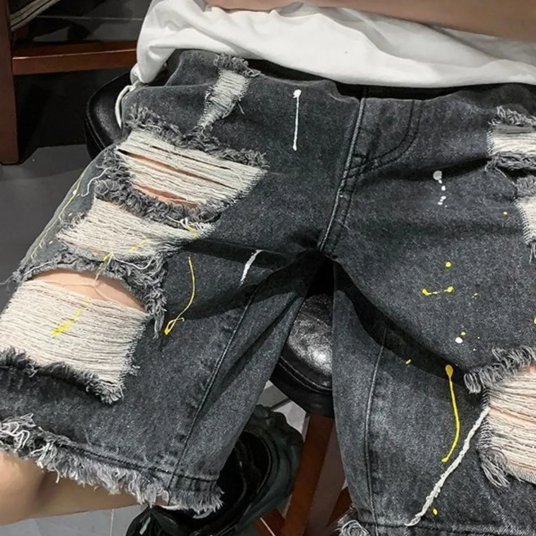 Men's loose fit water washed denim shorts with hole detailing in black and light blue colours