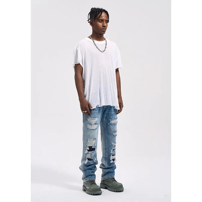 Vintage loose casual jeans for men in wash blue denim with relaxed fit and straight leg design