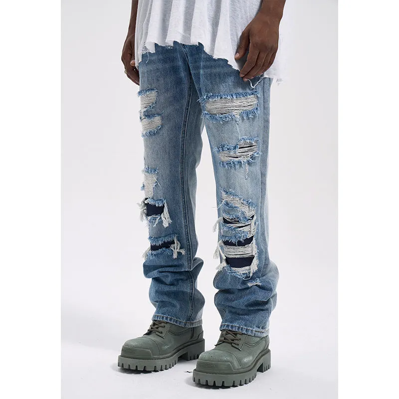 Vintage loose casual jeans for men in wash blue denim with relaxed fit and straight leg design