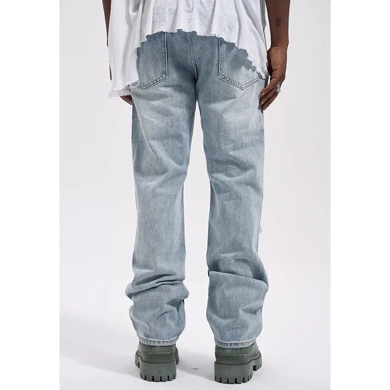 Vintage loose casual jeans for men in wash blue denim with relaxed fit and straight leg design