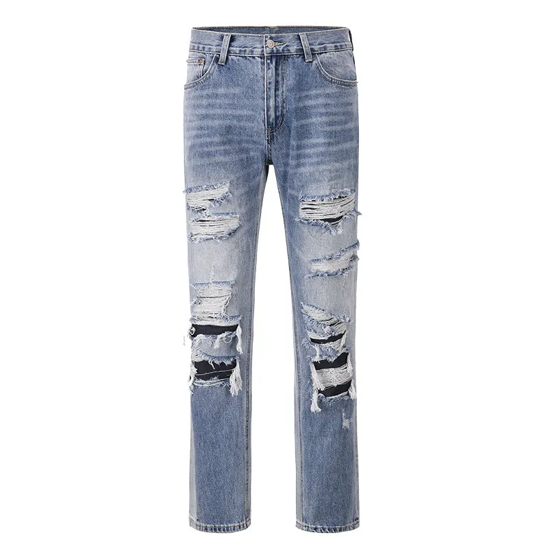 Vintage loose casual jeans for men in wash blue denim with relaxed fit and straight leg design