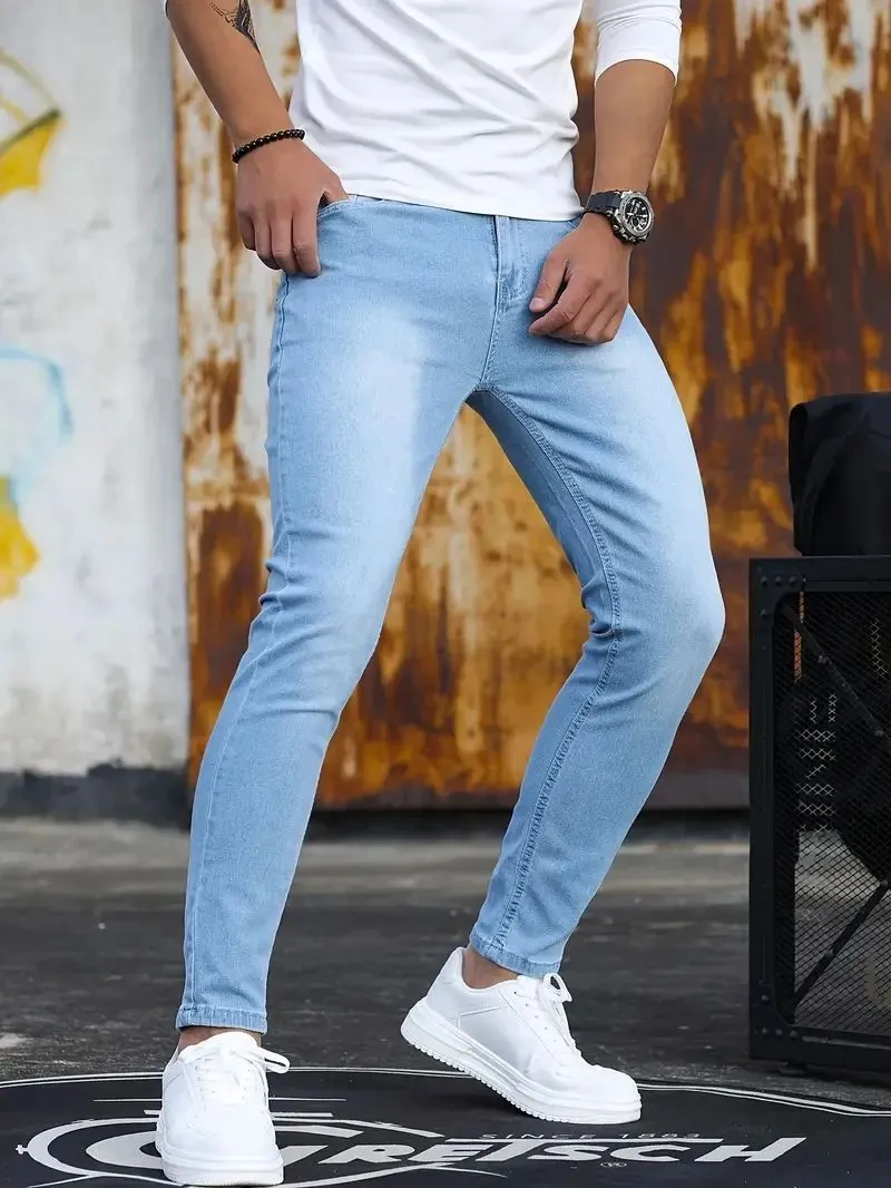 Men's retro washing stretch slim fit jeans in blue, front view, five-quarter length