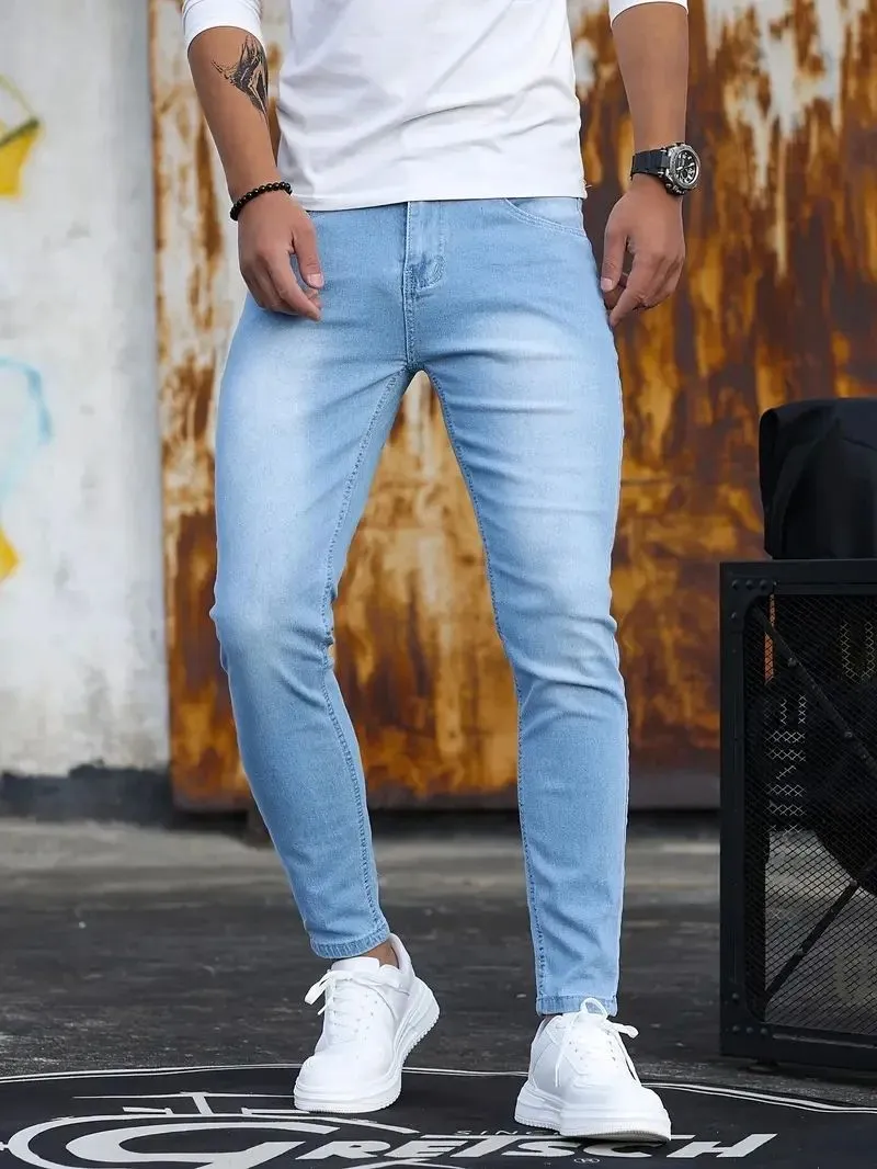 Men's retro washing stretch slim fit jeans in blue, front view, five-quarter length