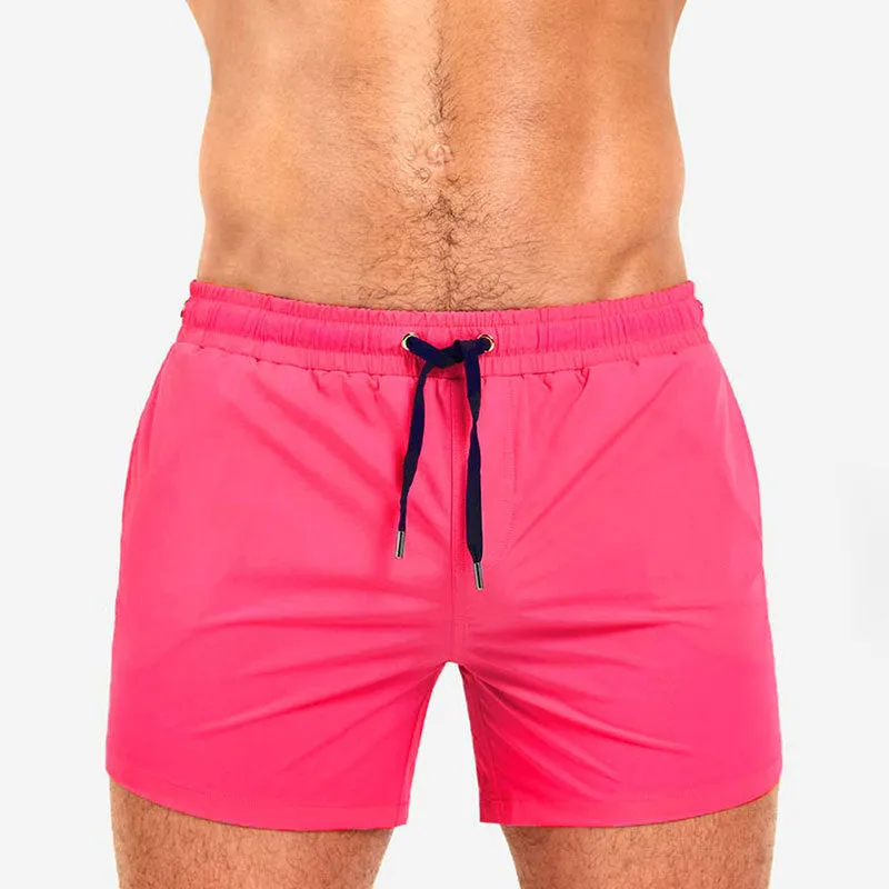 Men's solid colour polyester sports shorts with mesh lining in six colour options