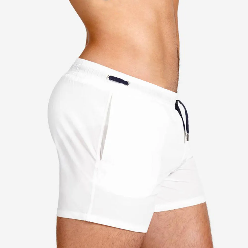 Men's solid colour polyester sports shorts with mesh lining in six colour options