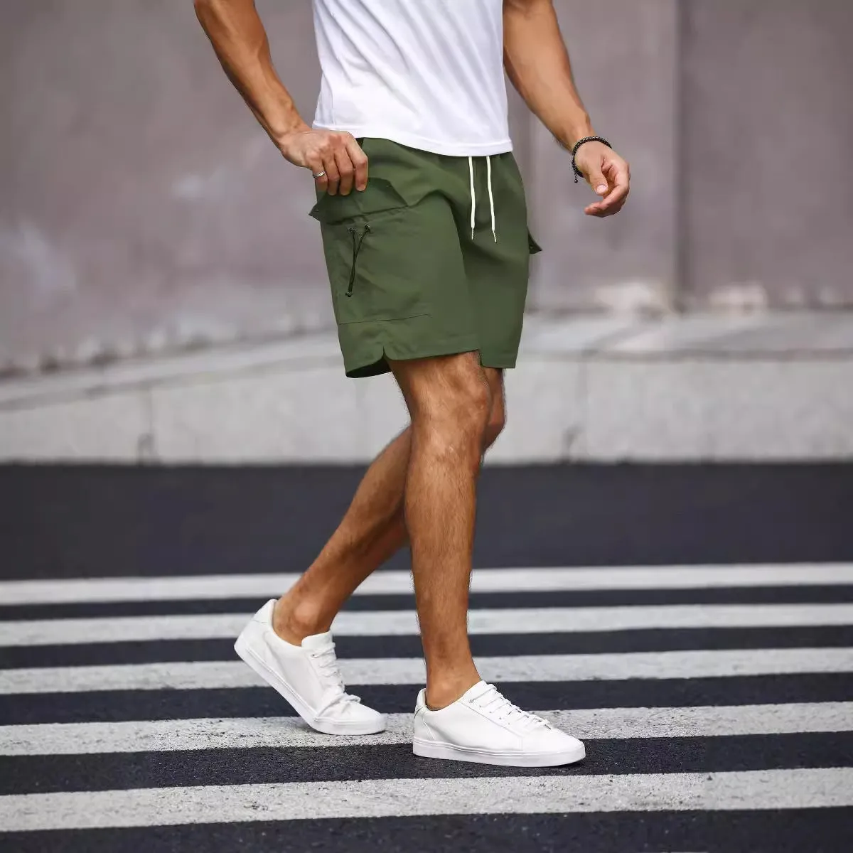 Men's loose fit workwear shorts in army green colour with straight leg cut and micro-elastic fabric