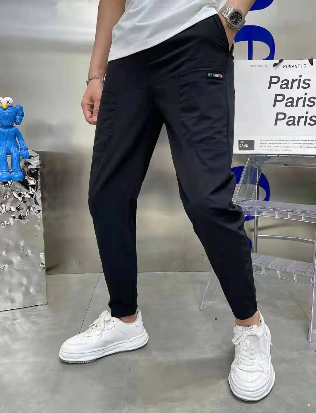 Men's ice silk stitching six-pocket high elastic casual pants in khaki colour