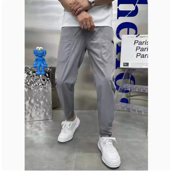 Men's ice silk stitching six-pocket high elastic casual pants in khaki colour