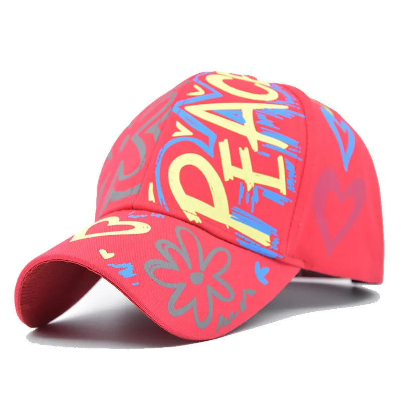 Cotton twill alphabet baseball cap in red, black, white, and pink options with adjustable strap
