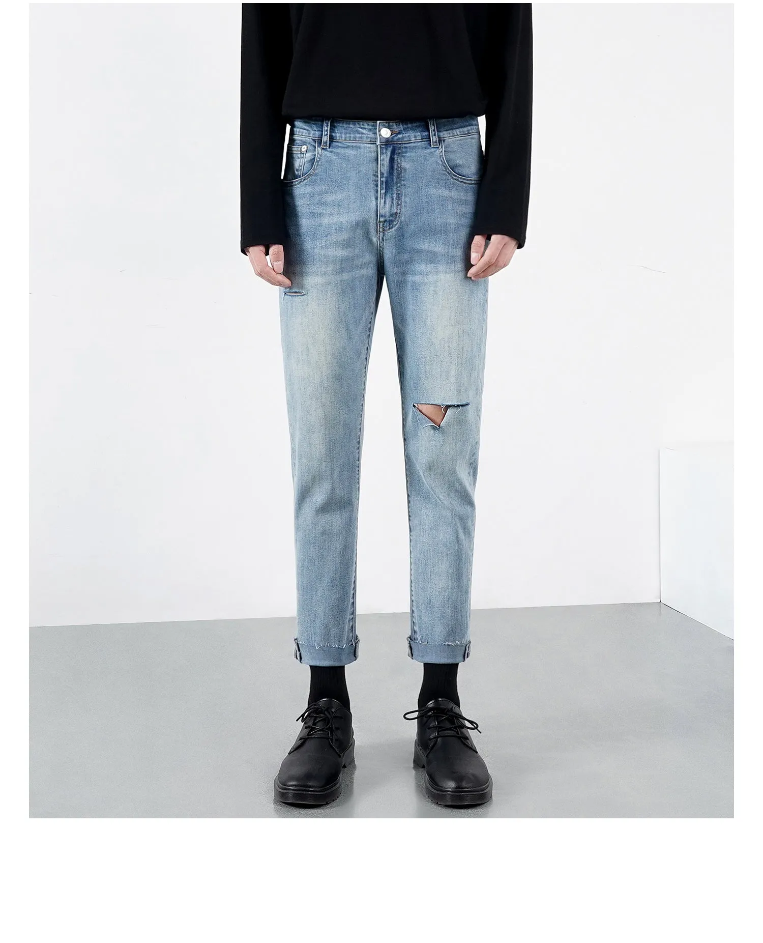 Men's light summer ripped jeans in blue with microelastic stretch denim, front view