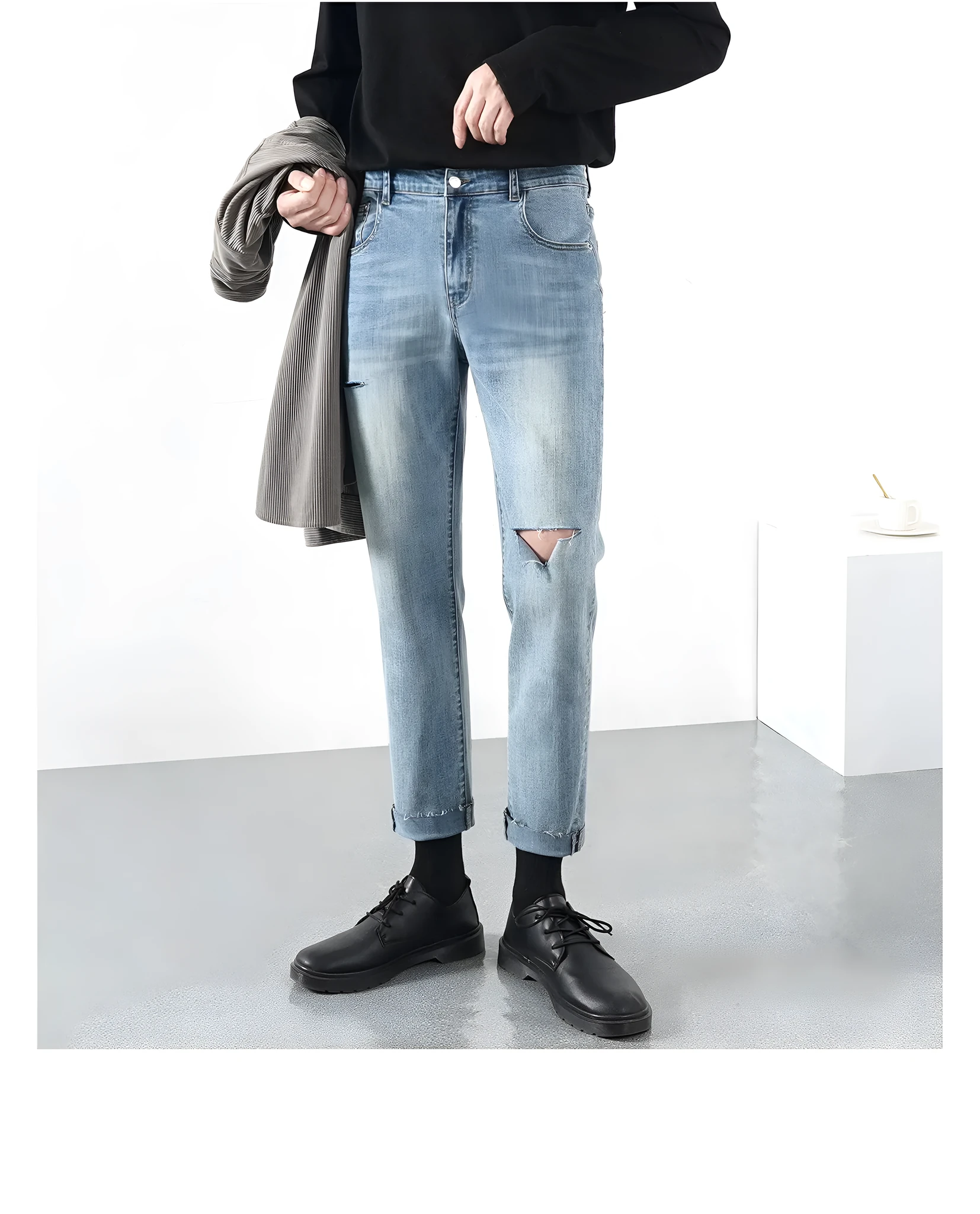 Men's light summer ripped jeans in blue with microelastic stretch denim, front view