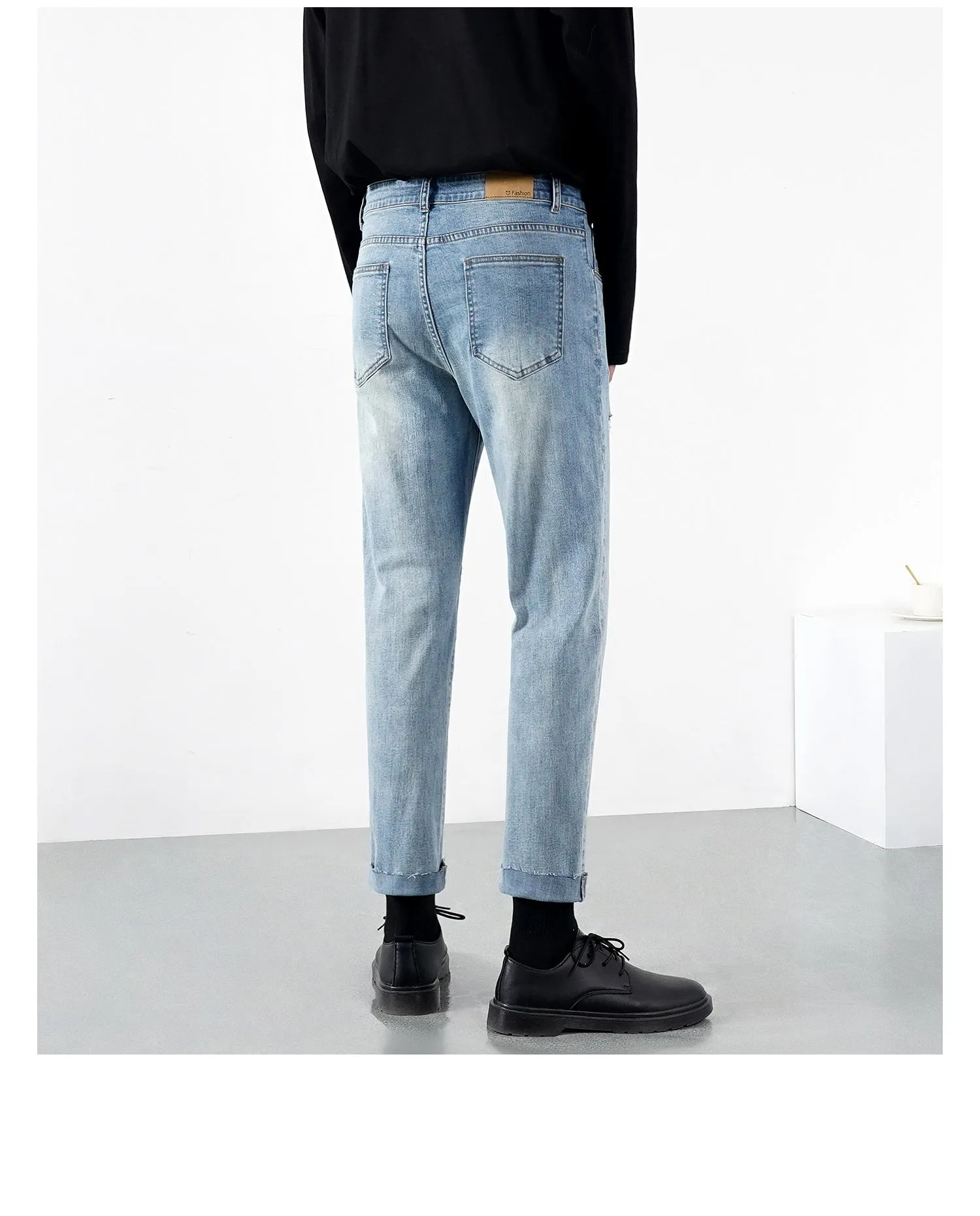 Men's light summer ripped jeans in blue with microelastic stretch denim, front view