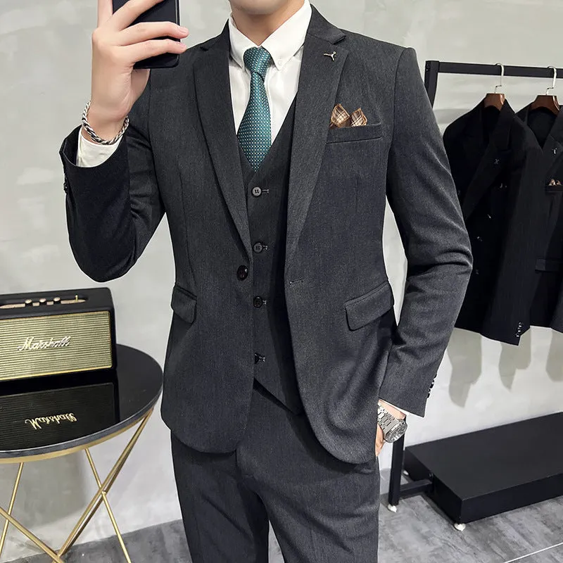 Men's striped three-piece suit set in black slim fit with jacket, vest, and trousers on a hanger