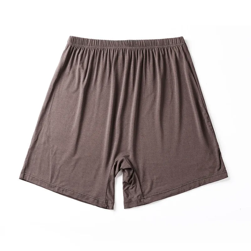 Men's solid colour modal boxer shorts with high waist, shown in black, blue, grey and brown.