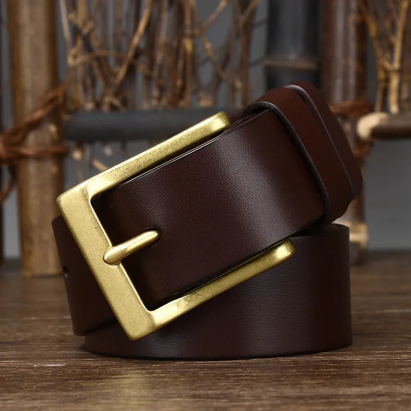 Men's brown leather belt with copper pin buckle on a plain background showing glossy first layer cowhide finish
