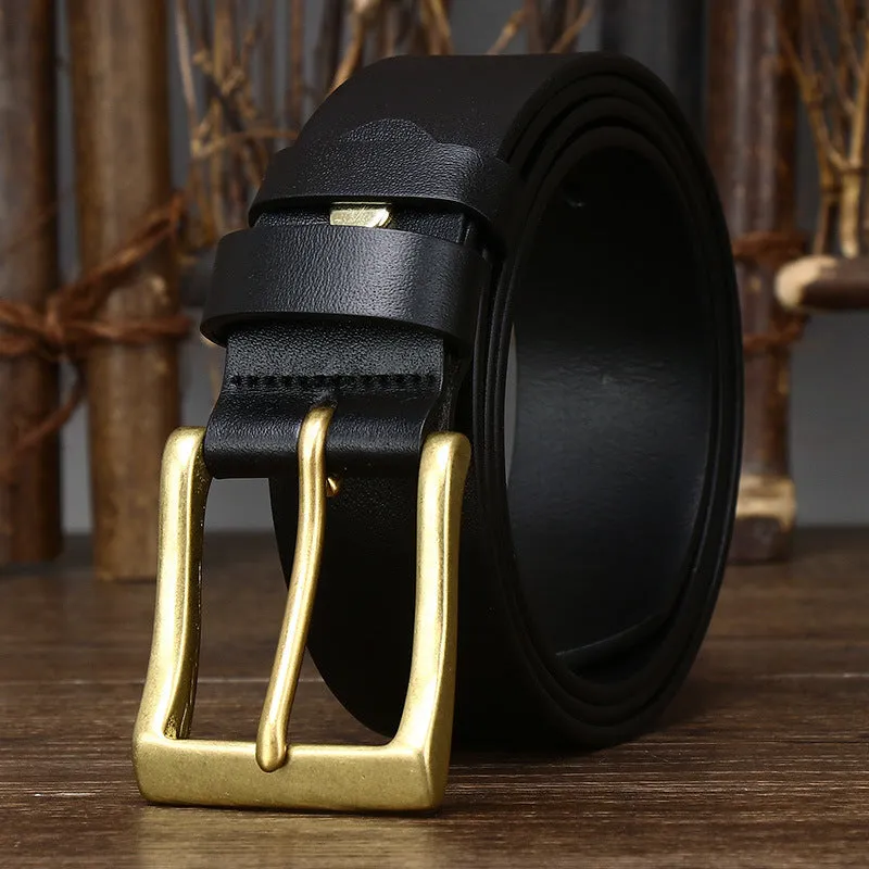 Men's brown leather belt with copper pin buckle on a plain background showing glossy first layer cowhide finish