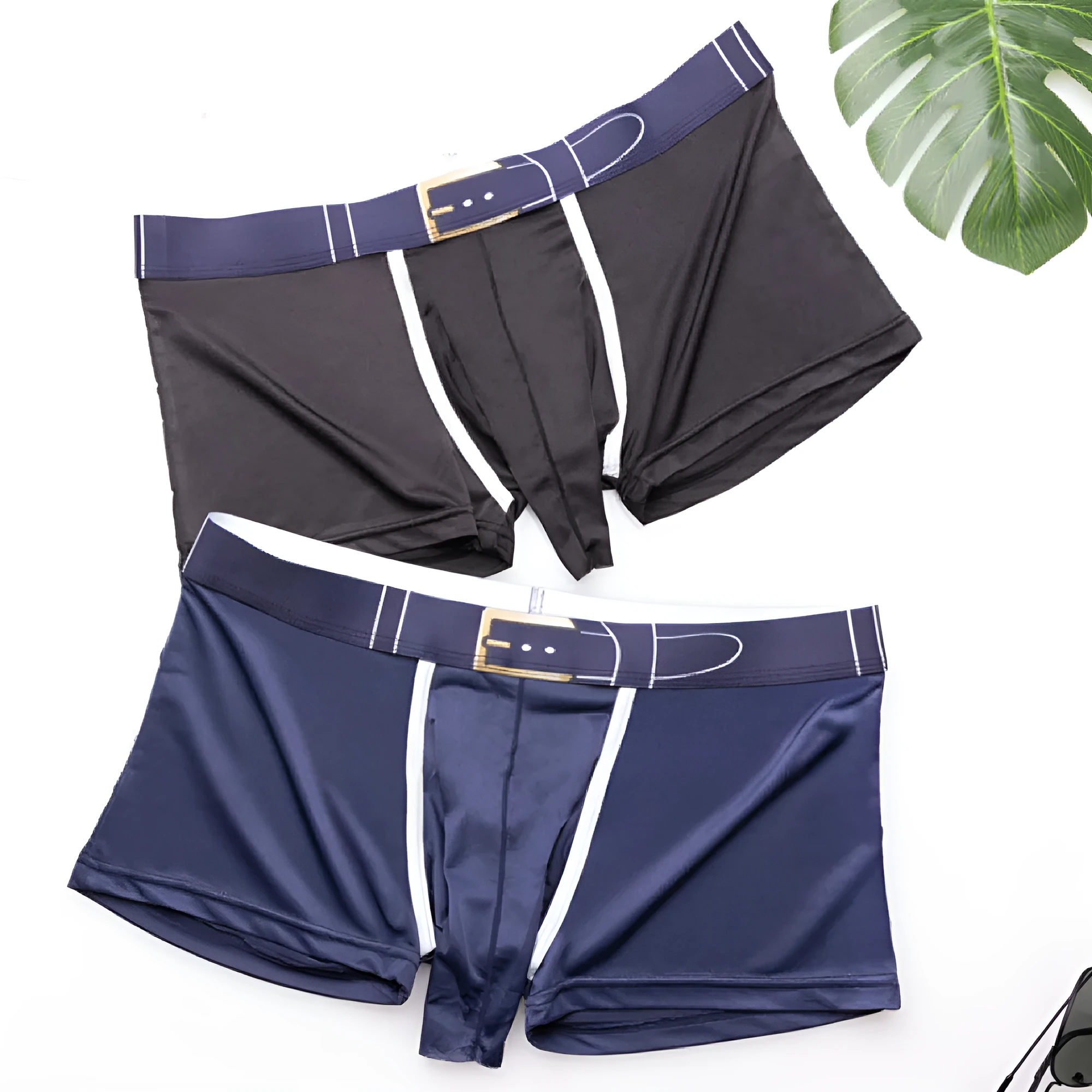 A pair of solid grey men's ice silk boxers laid flat, showing the mid-waist design.