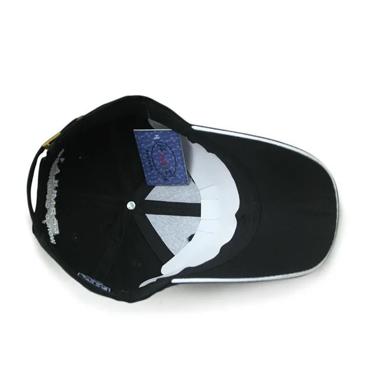 Black canvas baseball cap with embroidery and adjustable closure on a neutral background