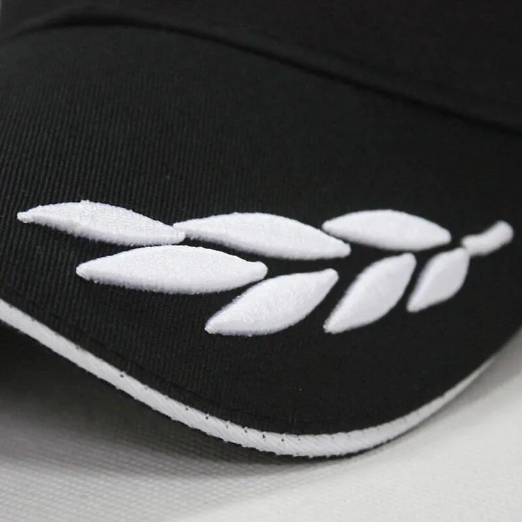 Black canvas baseball cap with embroidery and adjustable closure on a neutral background