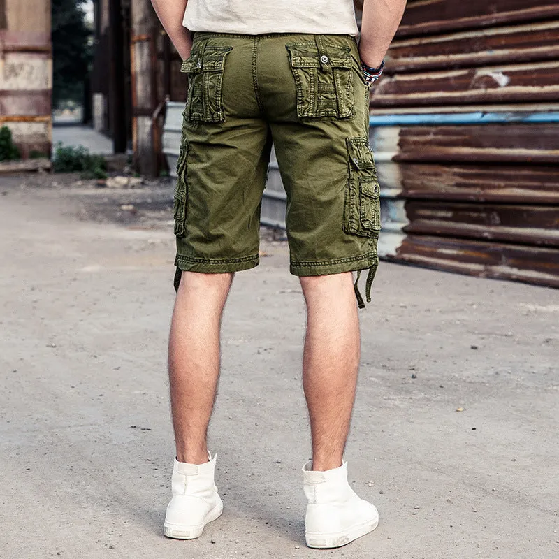 Multi-bag tooling shorts in 100% cotton with multiple pockets, straight leg, and zipper fly in army green