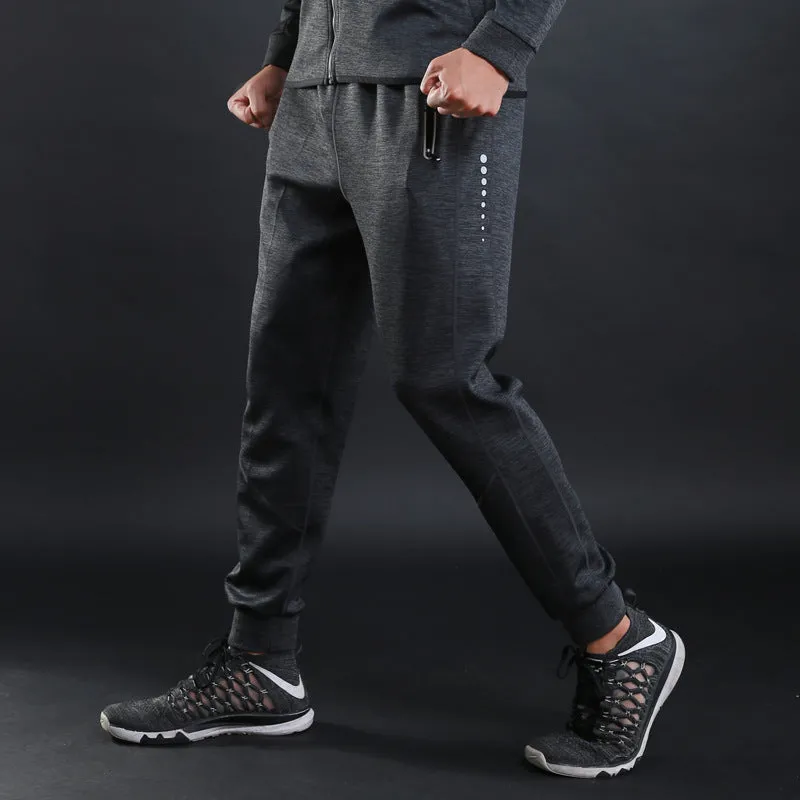 Grey and Royal Blue polyester fitness trousers with elastic waist for training and casual wear