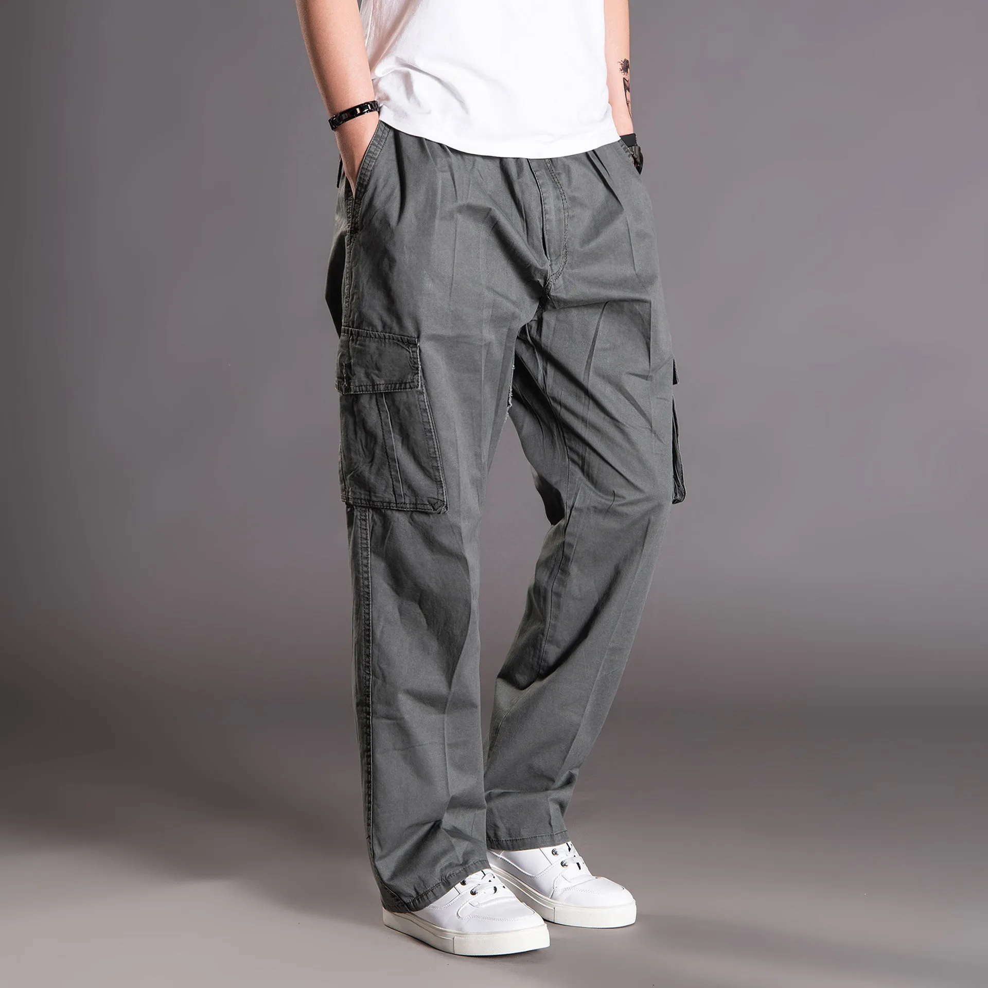 Cotton loose straight leg cargo trousers in black with multiple pockets and zip fly