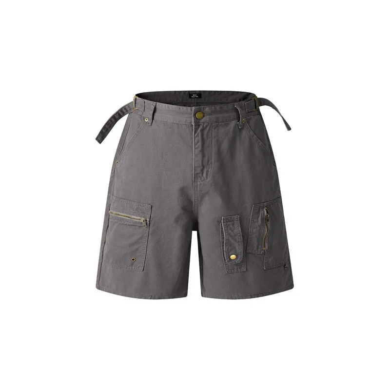Retro loose-fit washed cotton shorts in camouflage with a zipper pocket.