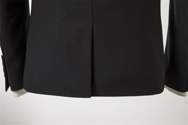 Men's black slim-fit one-button business suit with flat collar and rear slit on a hanger.