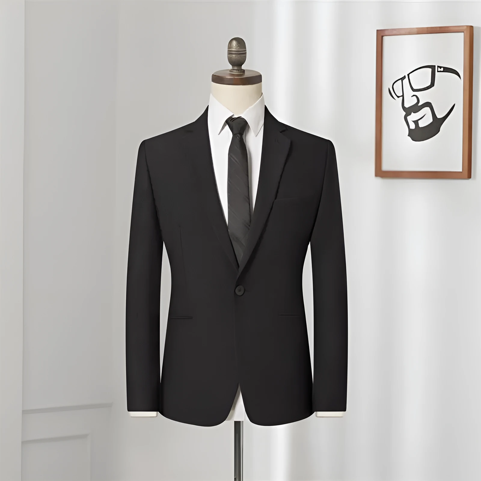 Men's black slim-fit one-button business suit with flat collar and rear slit on a hanger.