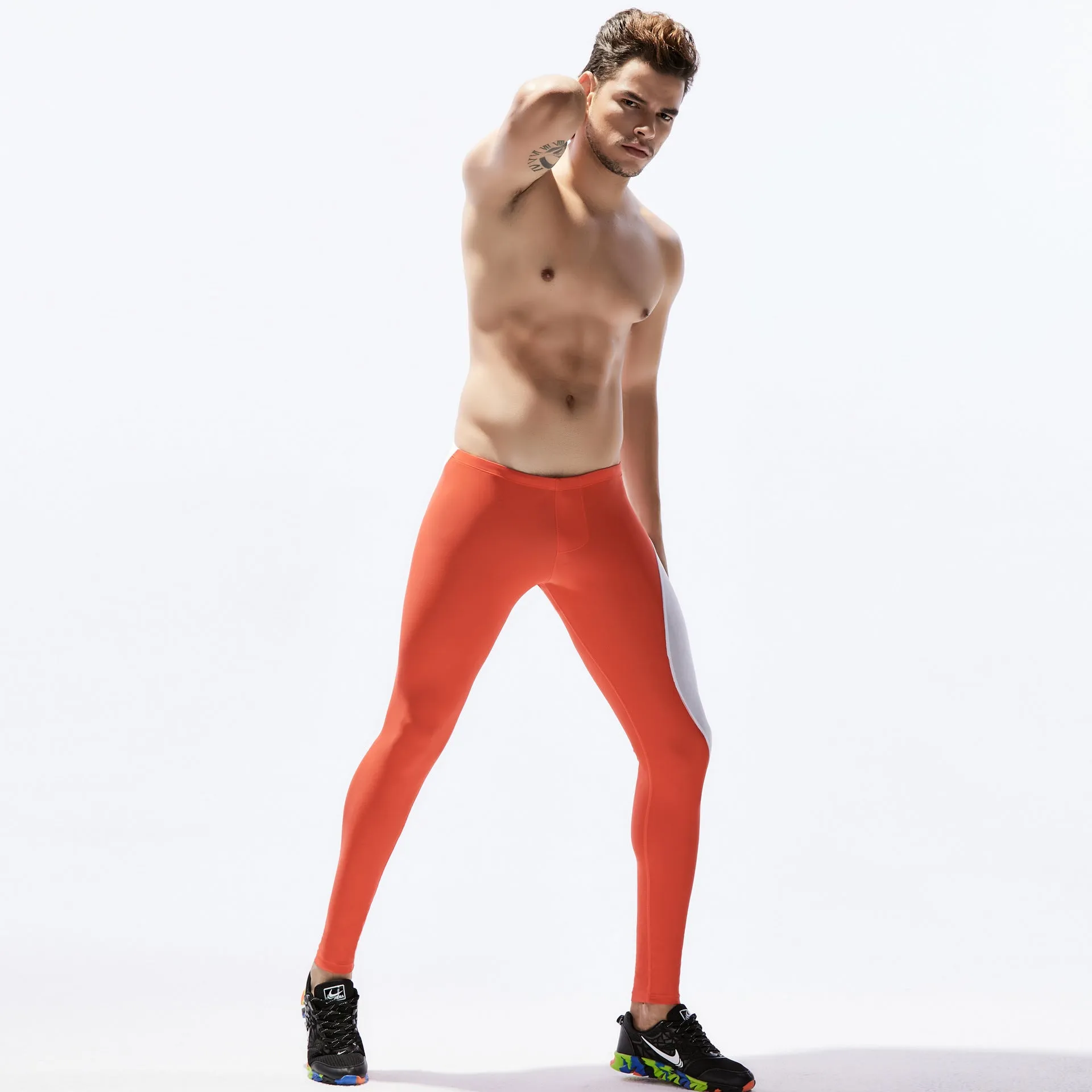 Men sports tight stretch fitness pants in breathable nylon, black blue colour, tight fit for running and gym training