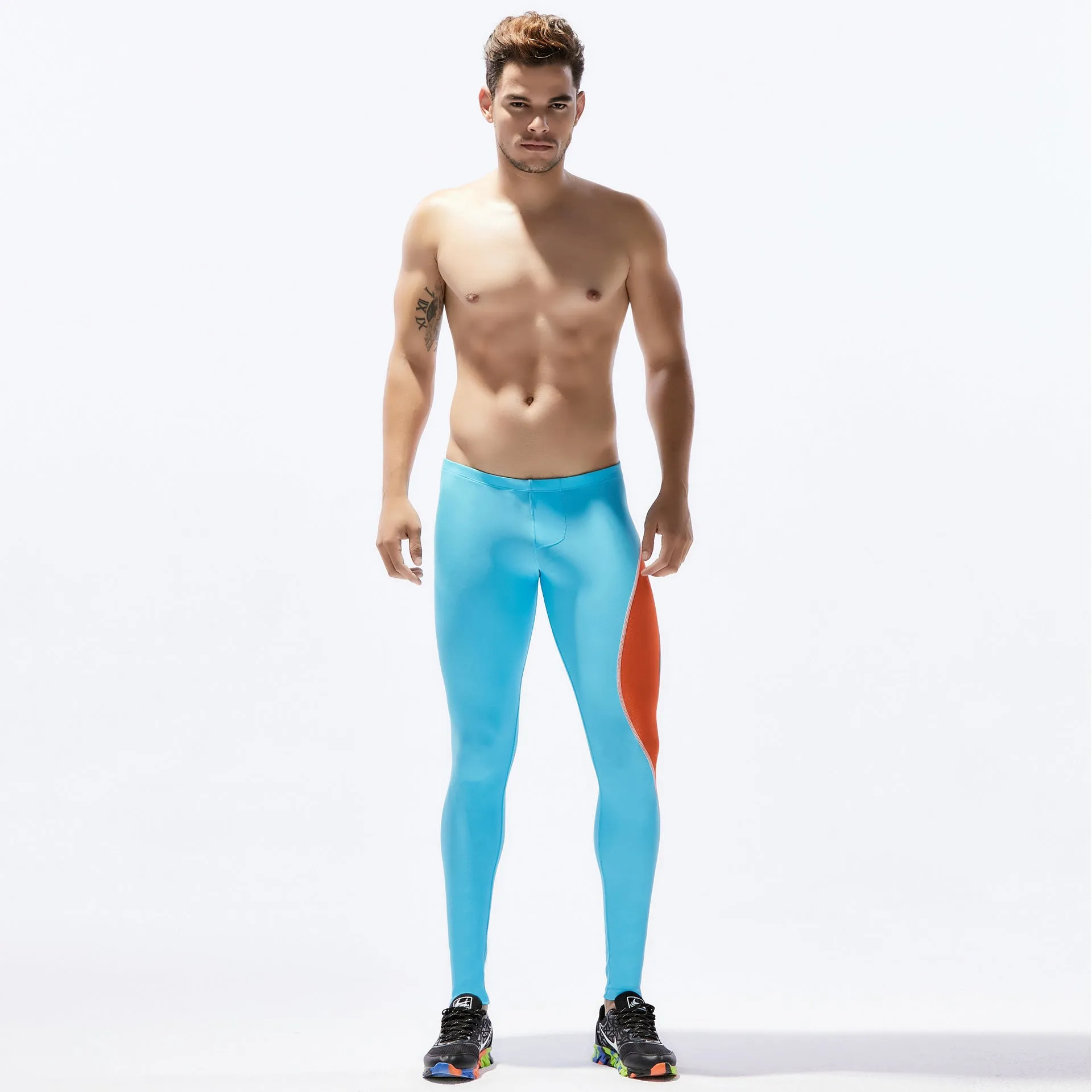 Men sports tight stretch fitness pants in breathable nylon, black blue colour, tight fit for running and gym training