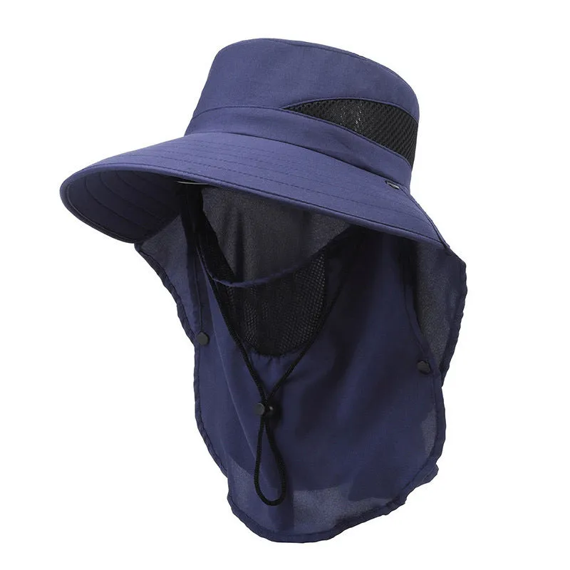 Men's grey fisherman hat with wide brim, shown from the side on a wooden post outdoors.
