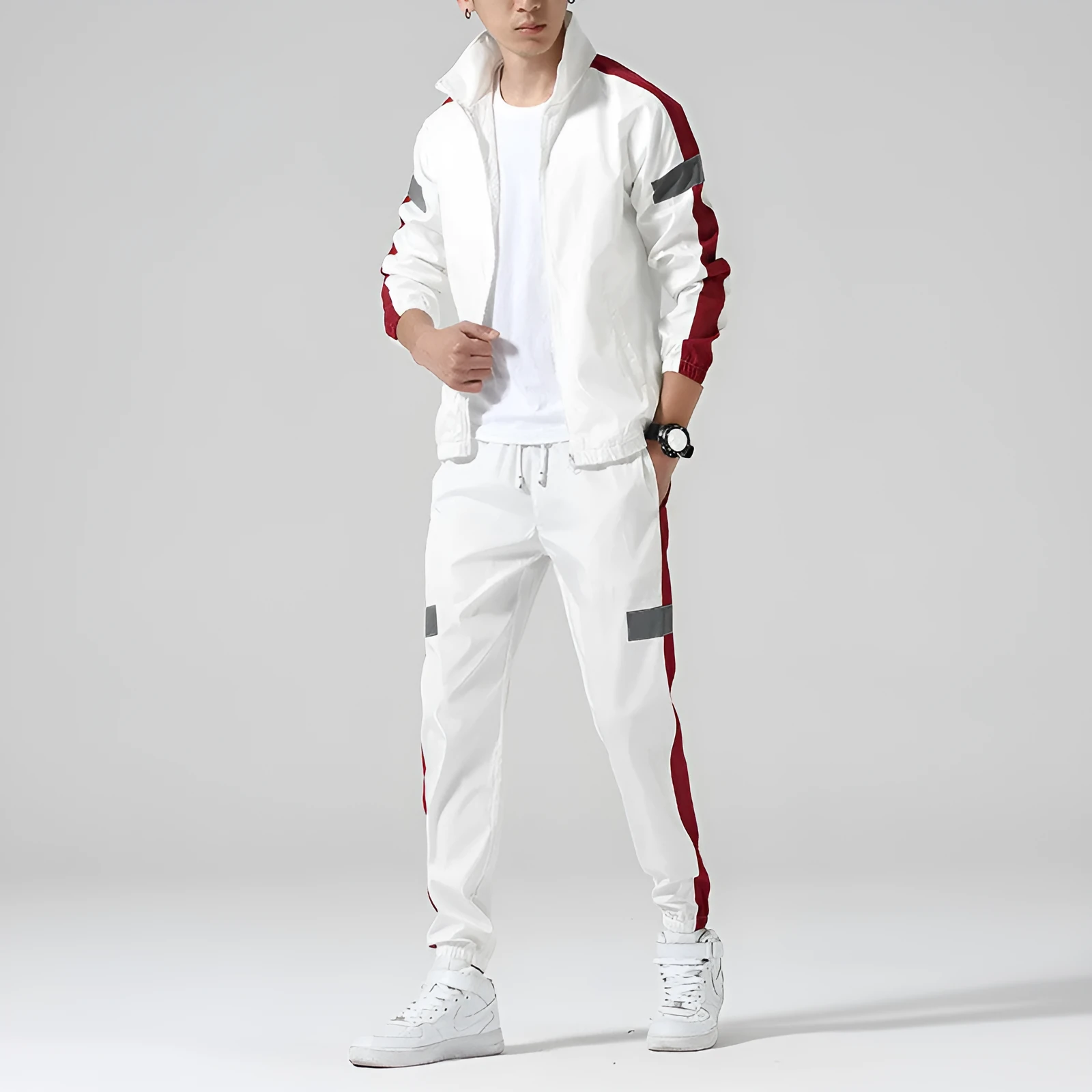 Reflective track suit in black polyester with reflective strips, front view