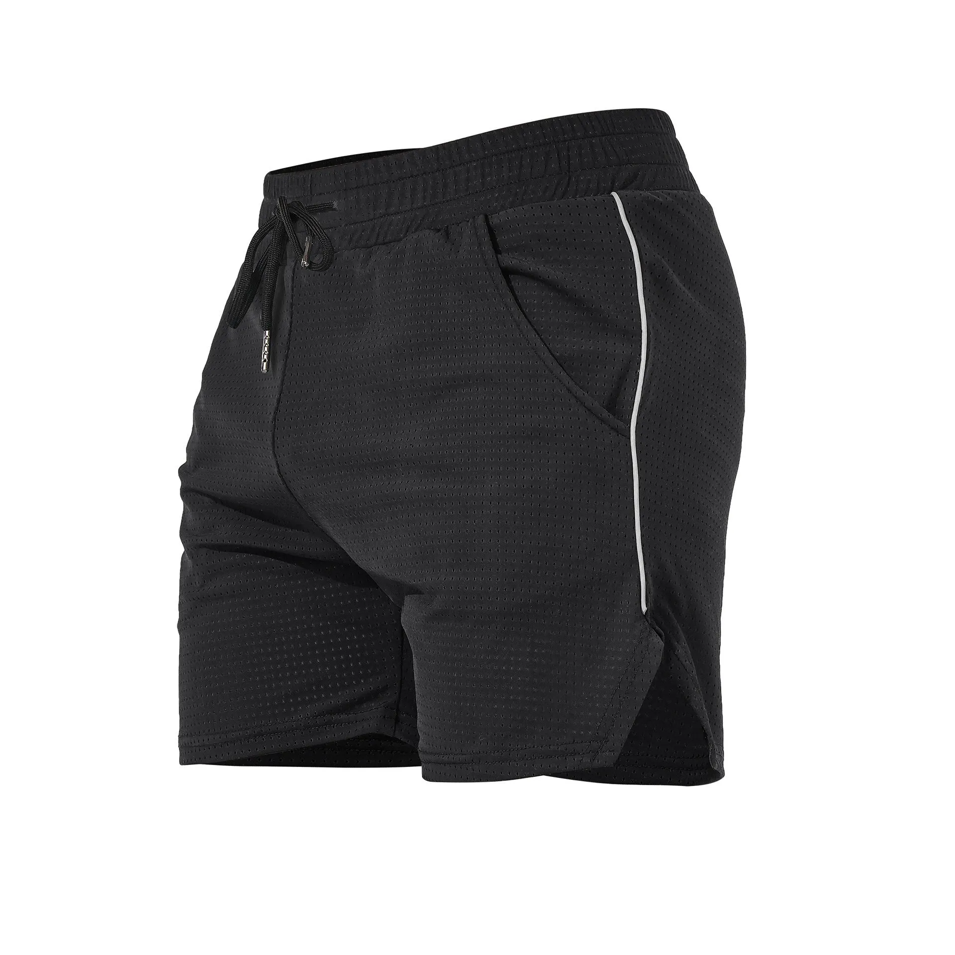 Man wearing straight-cut black polyester fitness shorts for sports and casual activities.