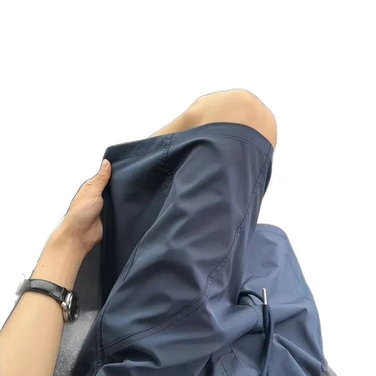 Men's quick-drying polyester sports shorts with slant pockets in black colour