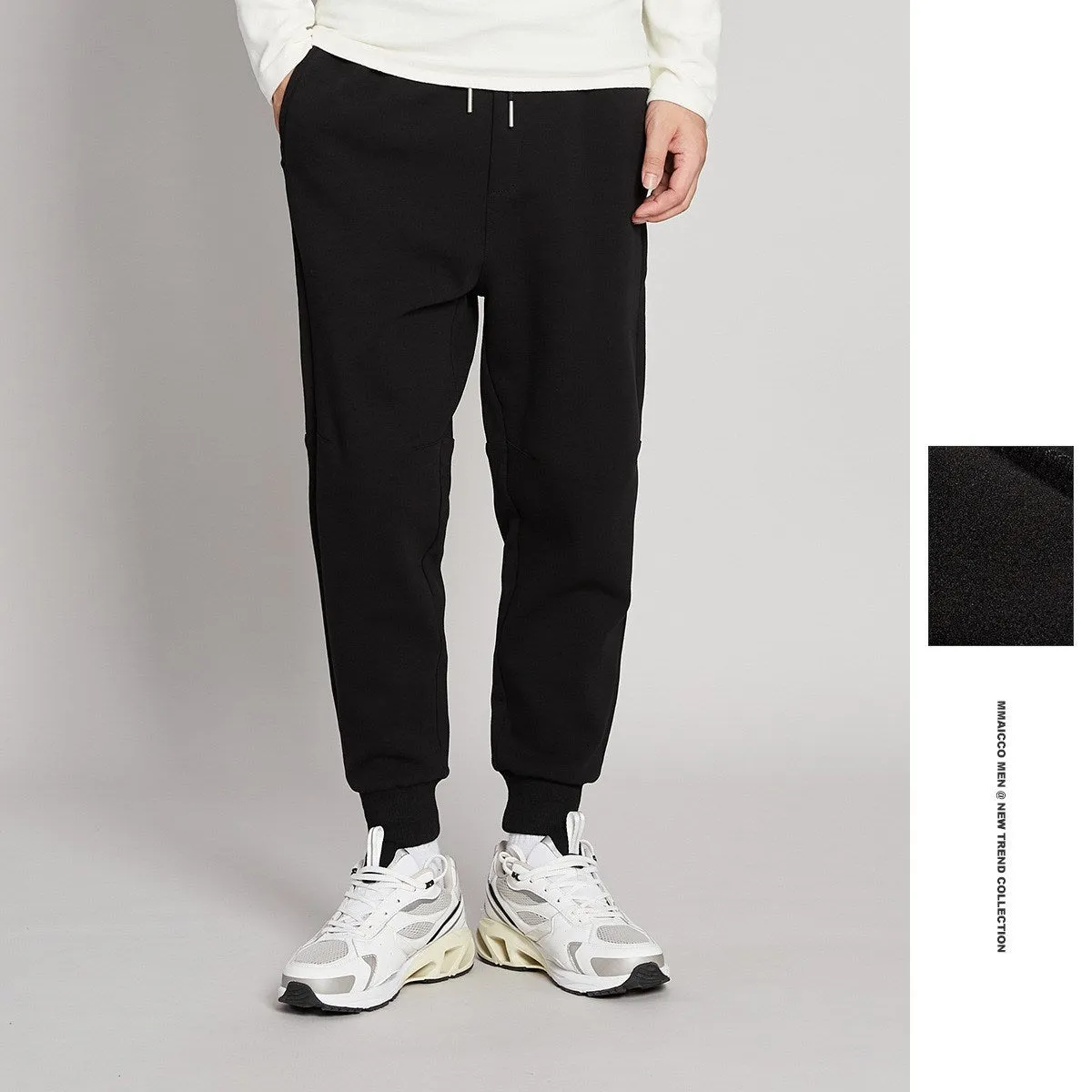 Cotton blend mid-waist drawstring loose fit nine-tenths men's casual pants in grey with tether closure